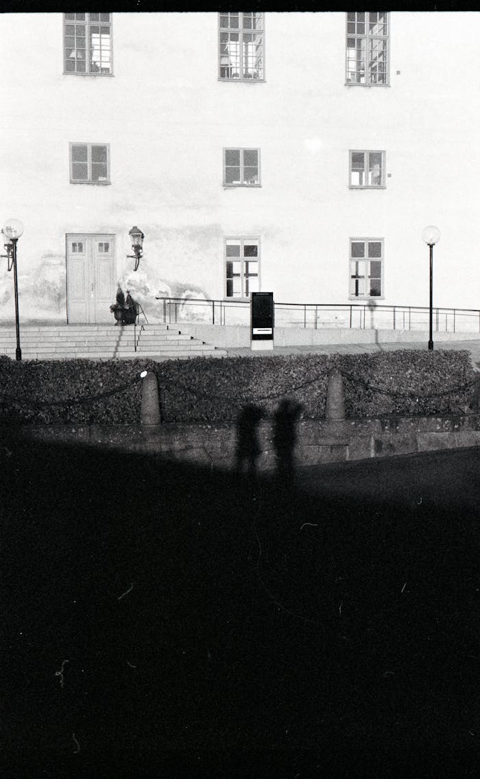 Black and white photo of building shadows in Uppsala, Sweden.